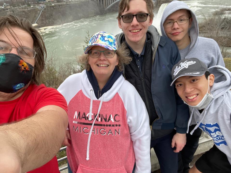 Exchange student Chuong Sy "Bill" Nguyen from Vietnam, right, is pictured at Niagara Falls with his host family, the Shawvers of Adrian, including host mother Anita Shawver, who also is a coordinator with Educatius, a youth exchange program.