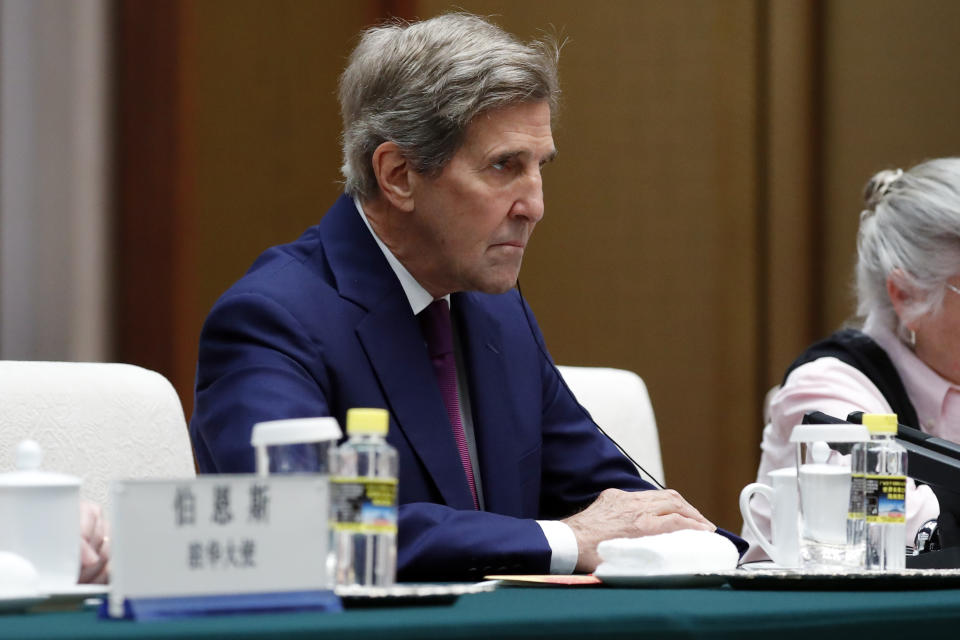 U.S. Special Presidential Envoy for Climate John Kerry attends a meeting with Chinese top diplomat Wang Yi at the Great Hall of the People in Beijing Tuesday, July 18, 2023. (Florence Lo/Pool Photo via AP)
