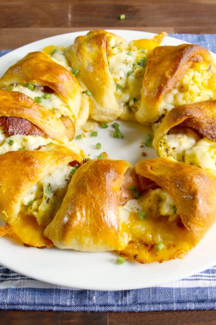 <p>You're stuffing a crescent roll with cheesy eggs and bacon. You're welcome.</p><p>Get the recipe from <a href="https://www.delish.com/cooking/recipe-ideas/recipes/a48554/crescent-breakfast-ring-recipe/" rel="nofollow noopener" target="_blank" data-ylk="slk:Delish" class="link rapid-noclick-resp">Delish</a>.</p>
