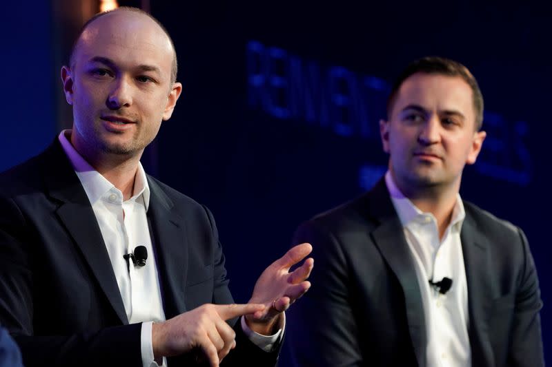 FILE PHOTO: Lyft's cofounders, Green and Zimmer, speak at the 2019 WSJTECH live conference in Laguna Beach, California