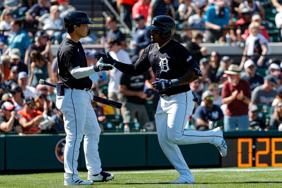 Tigers third baseman Andy Ibáñez celebrates a two-run home run against the Yankees during the second inning of the Grapefruit League season opener at Joker Marchant Stadium in Lakeland, Florida, on Saturday, Feb. 24, 2024.