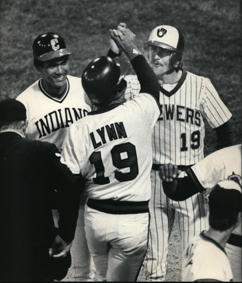 Robin Yount (right) and Manny Trillo welcome Fred Lynn at home plate after his grand slam in the 1983 all-star game. Rod Carew was also on base for the only grand slam in all-star game history.