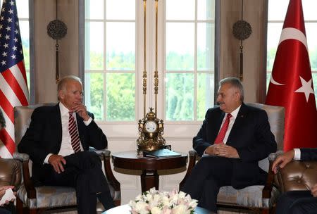 Turkish Prime Minister Binali Yildirim (R) meets with U.S. Vice President Joe Biden in Ankara, Turkey, August 24, 2016. Mustafa Aktas/Prime Minister's Press Office/Handout via REUTERS