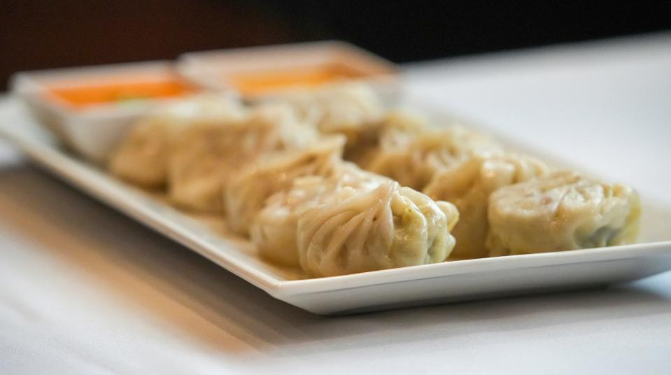 A yak momo, yak meat-filled dumplings at Yak and Yeti in Fishers, Monday, Oct. 30, 2023, a Himalayan restaurant that serves dishes from the region near Nepal.