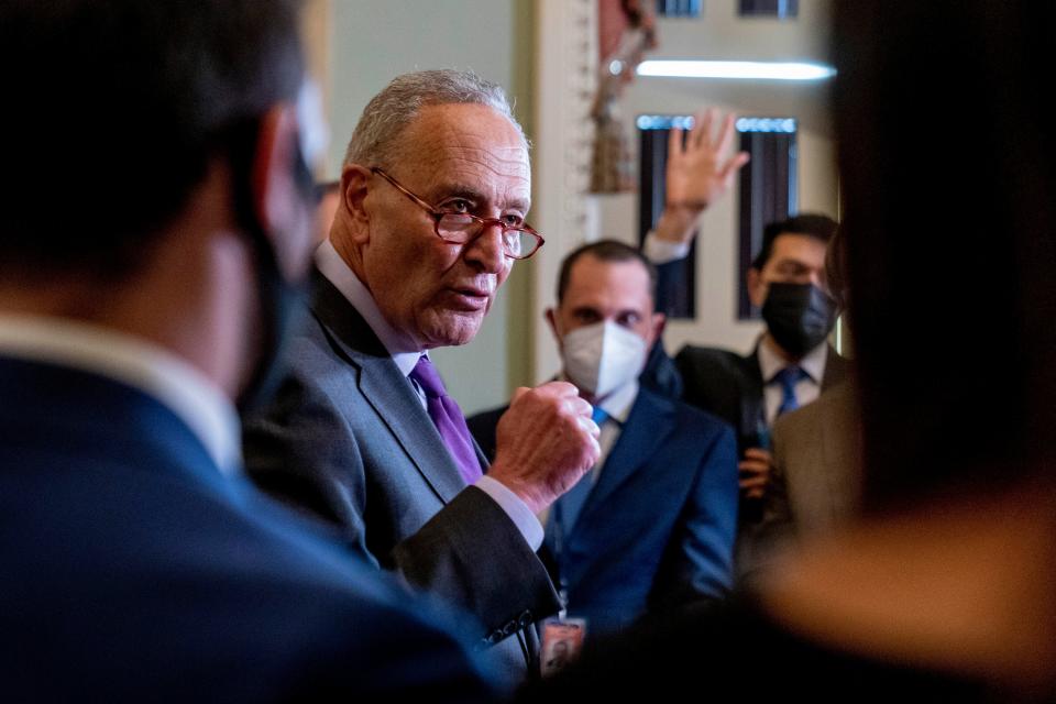 Senate Majority Leader Chuck Schumer, D-N.Y., speaks to reporters as work continues on the Democrats' Build Back Better Act, massive legislation that is a cornerstone of President Joe Biden's domestic agenda, at the Capitol, in Washington on Sept. 14, 2021.