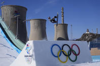 Redmond Gerard of the United States competes during the men's snowboard big air qualifications of the 2022 Winter Olympics, Monday, Feb. 14, 2022, in Beijing. (AP Photo/Jae C. Hong)