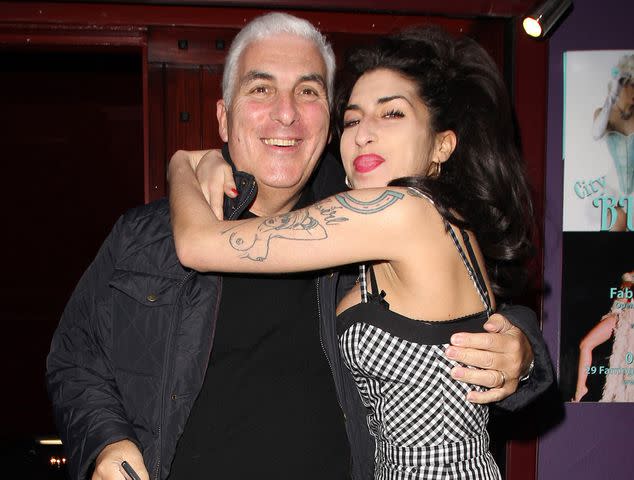 <p>Fred Duval/FilmMagic</p> Amy Winehouse and Mitch Winehouse outside Cityburlesque on October 7, 2010 in London, England.