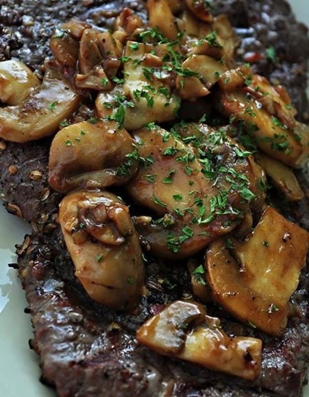 <p>Krista Marshall</p><p>Grilling cube steak and adding flavorful mushrooms take this inexpensive cut of meat to the next level.</p><p><strong>Get the recipe: <a href="https://parade.com/842283/kristamarshall/cubed-round-steak-with-steakhouse-mushrooms/" rel="nofollow noopener" target="_blank" data-ylk="slk:Cubed Round Steak With Steakhouse Mushrooms;elm:context_link;itc:0;sec:content-canvas" class="link rapid-noclick-resp">Cubed Round Steak With Steakhouse Mushrooms </a></strong></p><p><strong>Related: <a href="https://parade.com/1318862/parade/mushroom-recipes/" rel="nofollow noopener" target="_blank" data-ylk="slk:55 Best Mushroom Recipes For Freshly-Foraged Flavor;elm:context_link;itc:0;sec:content-canvas" class="link rapid-noclick-resp">55 Best Mushroom Recipes For Freshly-Foraged Flavor</a></strong></p>