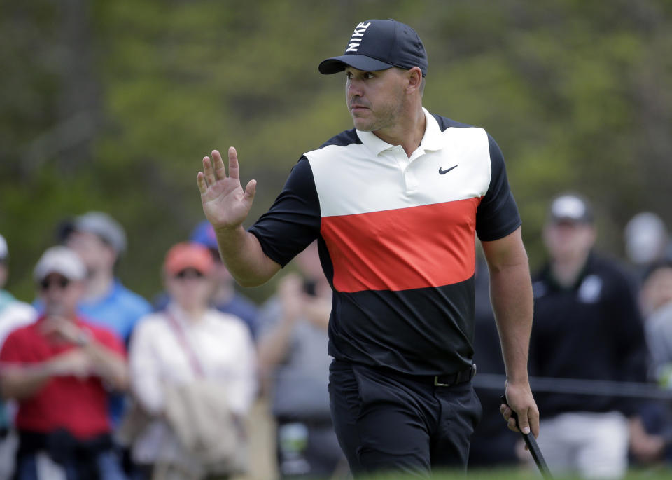 Brooks Koepka reacts after putting on the sixth green during the first round of the PGA Championship golf tournament, Thursday, May 16, 2019, at Bethpage Black in Farmingdale, N.Y. (AP Photo/Seth Wenig)