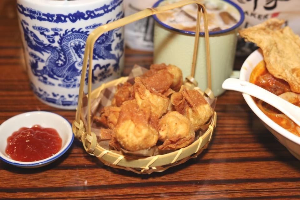 Snack on these plump fried wantans with your Chayang Curry Mee.