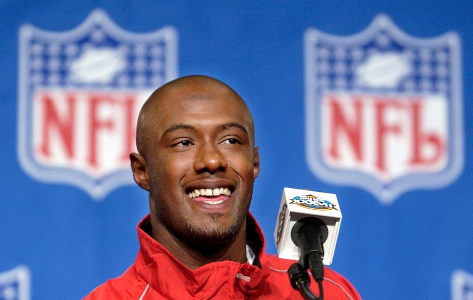 Tampa Bay Buccaneers safety Dexter Jackson smiles after he received the Pete Roselle Trophy during a news conference in San Diego, Calif., Monday, Jan. 27, 2003, for the Most Valuable Player in Sunday's Super Bowl XXXVII against the Oakland Raiders. (AP Photo/Paul Sakuma)