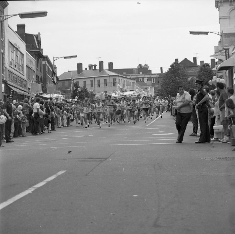 Photographer J.D. Lincoln shot this photo as runners in the first Market Square Day road race charged down Congress Street on June 10, 1978.