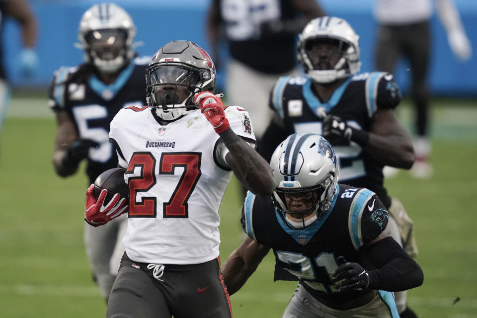 Tampa Bay Buccaneers running back Ronald Jones (27) runs for a 98-yard touchdown against the Carolina Panthers. (AP Photo/Gerry Broome)