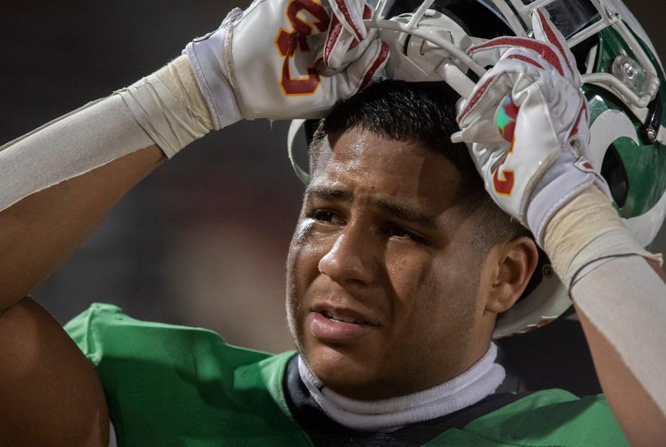 St. Mary's Jaden Jimenez is overcome with emotion after the team's 17-6 loss to Rocklin in the Sac-Joaquin Section Division II football final on Saturday.