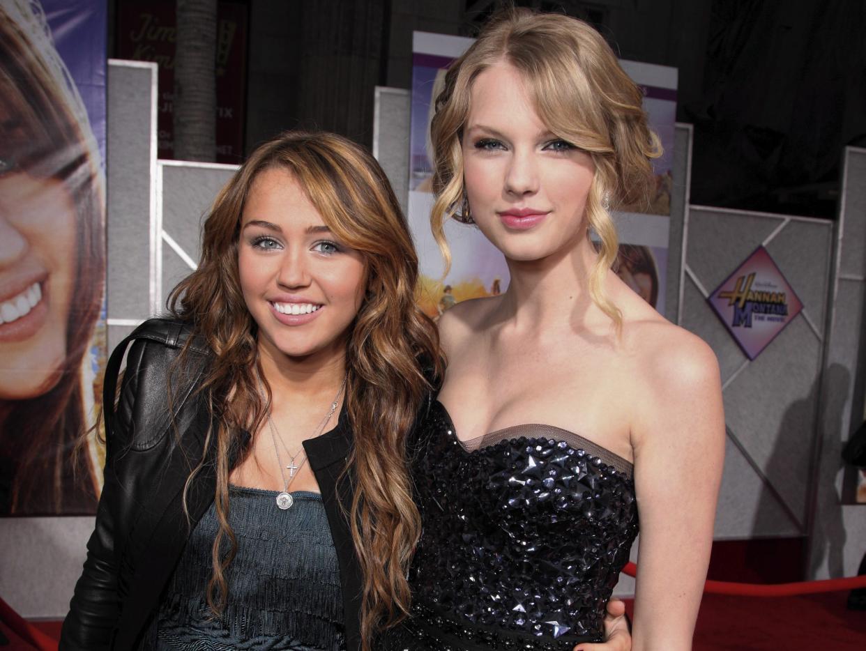 : Miley Cyrus and Taylor Swift at the World Premiere of Walt Disney Pictures "Hannah Montana The Movie" on April 02, 2009