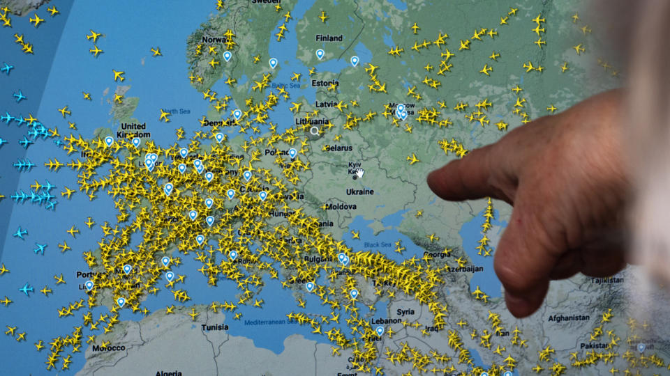 A flight-tracker map shows no aircraft flying over Ukraine.