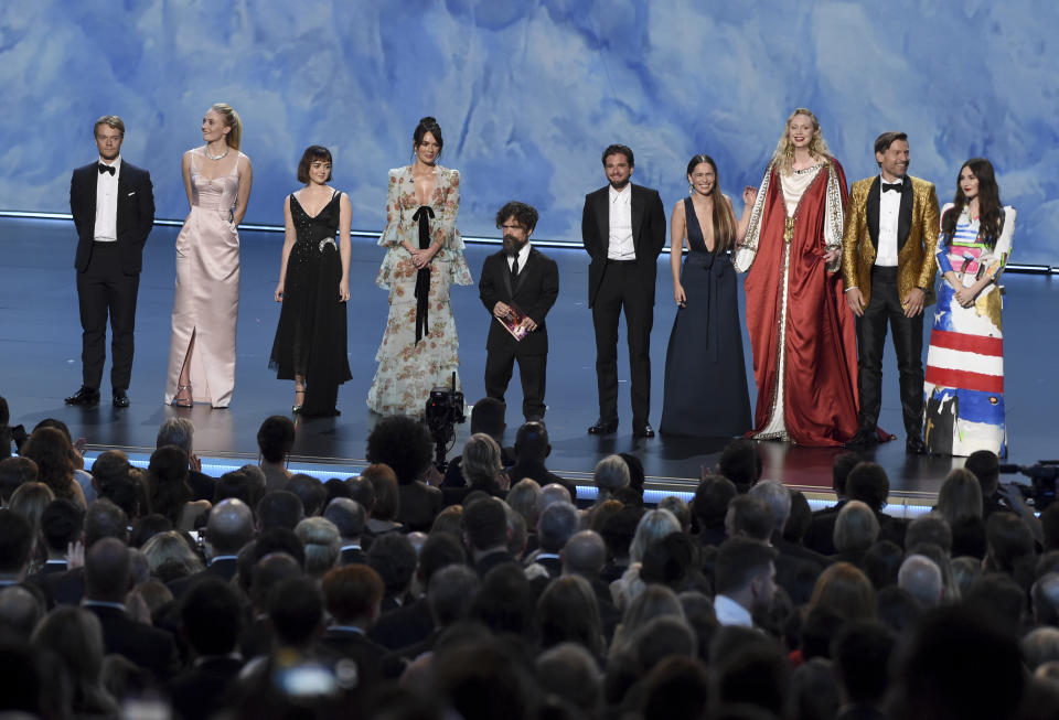 The cast of &quot;Game of Thrones&quot; appear on stage to present the award for outstanding supporting actress in a limited series or movie at the 71st Primetime Emmy Awards on Sunday, Sept. 22, 2019, at the Microsoft Theater in Los Angeles. From left are, Alfie Allen, Sophie Turner, Maisie Williams,Lena Headey, Peter Dinklage, Kit Harington Emilia Clarke, Gwendoline Christie, Nikolaj Coster-Waldau and Carice van Houten. (Photo by Chris Pizzello/Invision/AP)