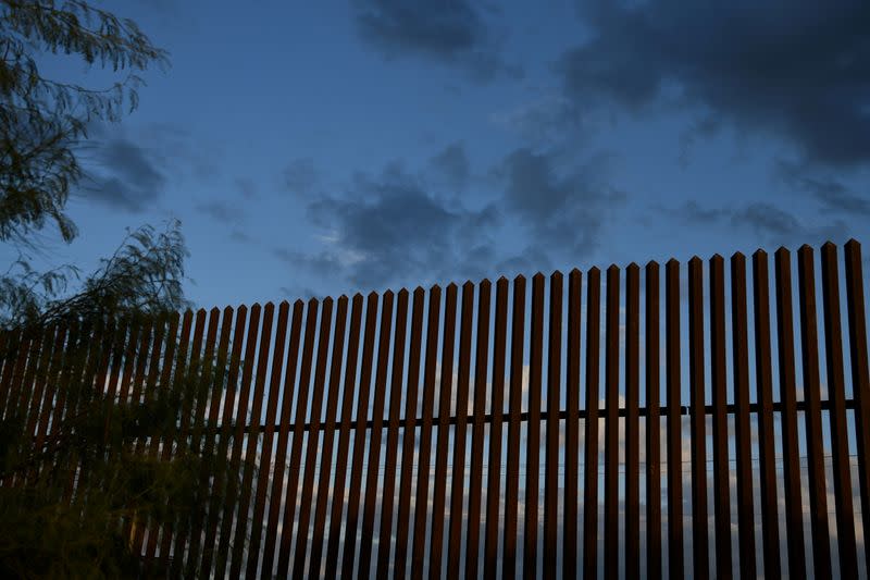 FILE PHOTO: A section of border fence is pictured by the U.S.-Mexico border in the Rio Grande Valley near Hidalgo