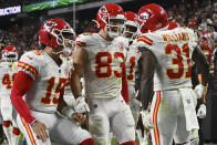 Kansas City Chiefs quarterback Patrick Mahomes (15) and tight end Noah Gray (83) celebrate after running back Darrel Williams (31) scored a touchdown against the Las Vegas Raiders during the second half of an NFL football game, Sunday, Nov. 14, 2021, in Las Vegas. (AP Photo/David Becker)
