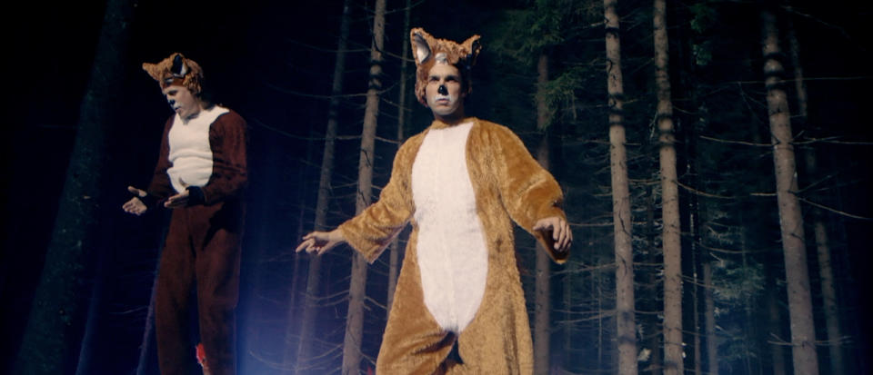 This image released by TVNorge/Concorde shows funny brothers Vegard, center, and Bard Ylvisaker, known as Ylvis (ILL-vis), who elevated the woodland creature in their video, "The Fox (What Does the Fox Say?)," in early September and have scored more than 150 million YouTube views of them prancing in fox suits singing: "Ring-ding-ding-ding-dingeringeding! Gering-ding-ding-ding-dingeringeding!" (AP Photo/TVNorge/Concorde)