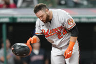 Baltimore Orioles' DJ Stewart drops his helmet after striking out in the eighth inning of a baseball game against the Cleveland Indians, Monday, June 14, 2021, in Cleveland. (AP Photo/Tony Dejak)