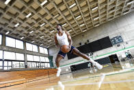 In a photo provided by SC30, Scoot Henderson works out at Laney College on Thursday, March 30, 2023, in Oakland, Calif. In an empty gym on a small campus deserted for spring break, Henderson, one of the NBA's top future prospects, receives shooting guidance from coaches on Stephen Curry's SC30 training team. (Noah Graham/SC30 via AP)