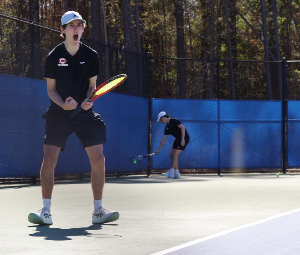 Patrick Allen celebrates a point during a tennis match during the 2024 season.