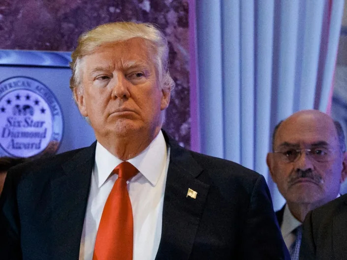 Former president Donald Trump is pictured with his former CFO Allen Weisselberg