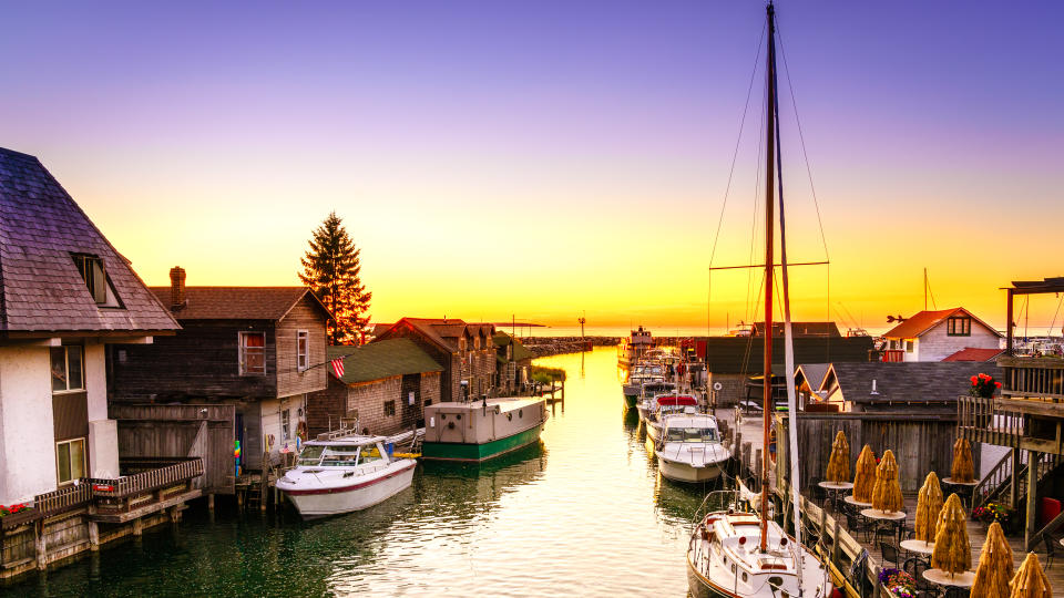 View of fishtown in Leland, Michigan at sunset.