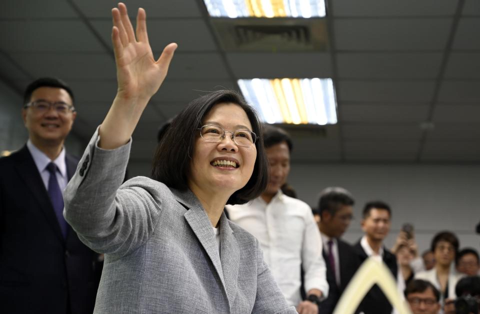 Taiwan's President Tsai Ing-wen waves while registering as the ruling Democratic Progressive Party (DPP) 2020 presidential candidate at the party's headquarter in Taipei on March 21, 2019. (Photo by SAM YEH / AFP)        (Photo credit should read SAM YEH/AFP/Getty Images)
