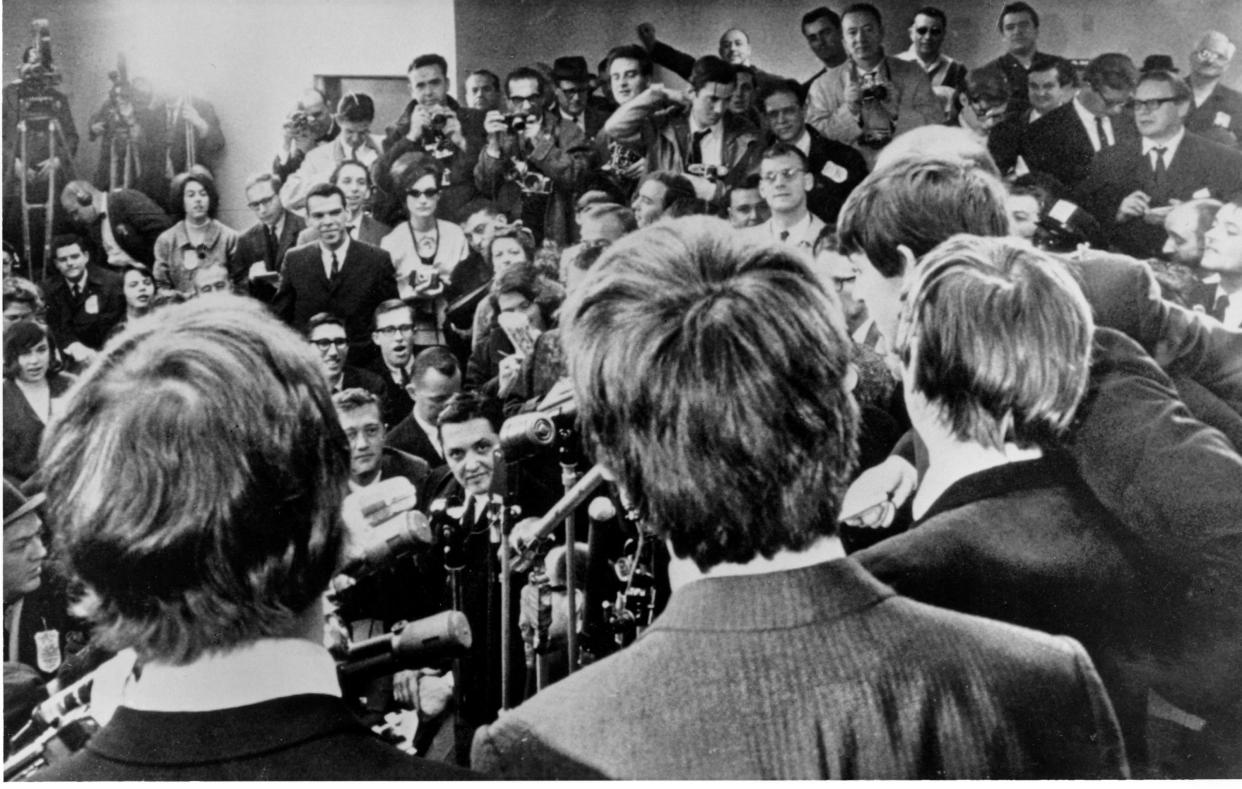 The Beatles face the media 