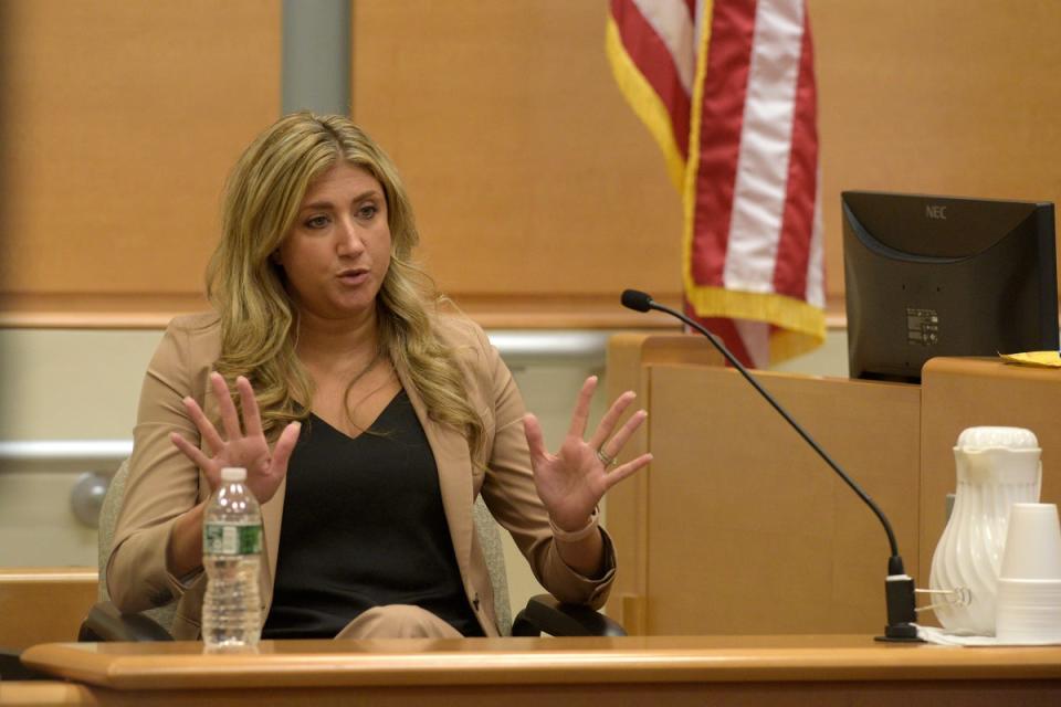 Brittany Paz, a lawyer for Infowars, testifies during Alex Jones’ Sandy Hook Elementary School defamation damages trial in Connecticut (AP)