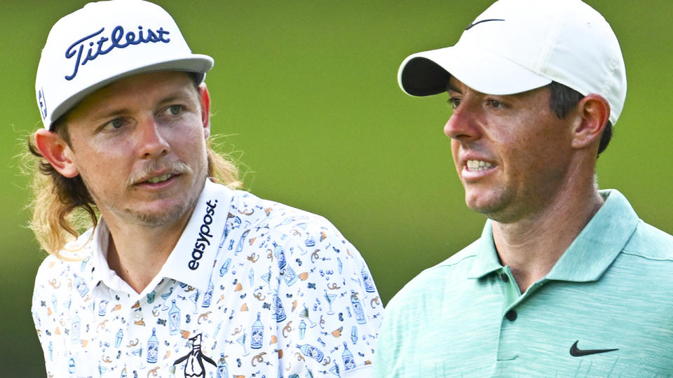 Cameron Smith and Rory McIlroy are pictured during round two of the Tour Championship.