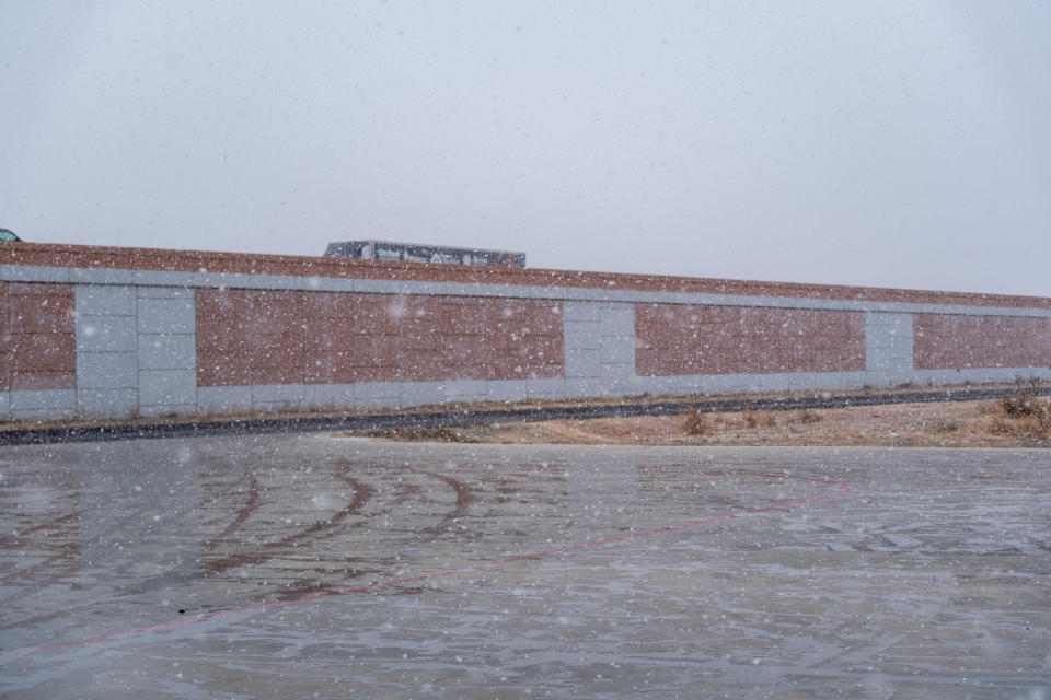 Flakes start to fall near McCormick Road as Amarillo gets its first snow of the season Saturday afternoon.