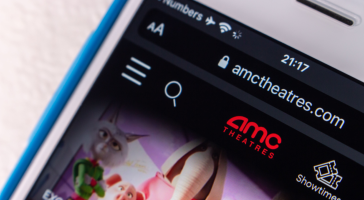 The logo of AMC Theatres, an US movie theater chain headquartered in Leawood, Kansas, on its website on an iPhone screen. AMC stock