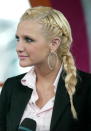 <p>Newly-engaged Ashlee Simpson puts a rock n roll twist on a french braid.</p>