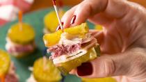 <p>Here at Delish, we LOVE a good <a href="https://www.delish.com/cooking/recipe-ideas/a23872214/classic-reuben-sandwich-recipe/" rel="nofollow noopener" target="_blank" data-ylk="slk:Reuben Sandwich;elm:context_link;itc:0;sec:content-canvas" class="link ">Reuben Sandwich</a>. These little bites ditch the bread for a low-carb snack worth making over and over again.</p><p>Get the recipe from <a href="https://www.delish.com/cooking/recipe-ideas/a30326675/reuben-pickle-bites-recipe/" rel="nofollow noopener" target="_blank" data-ylk="slk:Delish;elm:context_link;itc:0;sec:content-canvas" class="link ">Delish</a>.</p>