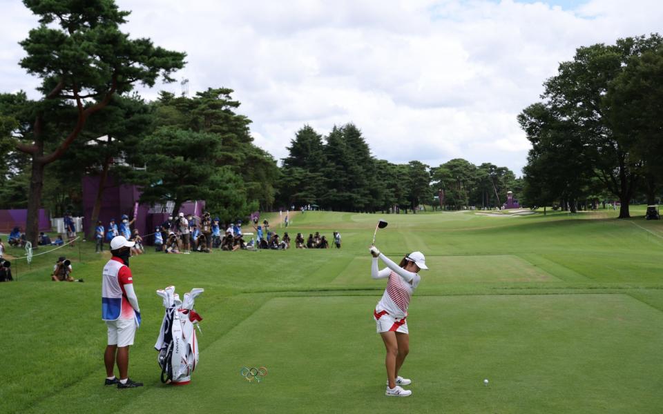 Mone Inami of Team Japan plays her shot from the 11th tee during the final round of the Women's Individual Stroke Play on day fifteen of the Tokyo 2020 Olympic Games at Kasumigaseki Country Club on August 07, 2021 in Kawagoe, Japan. - Chris Trotman/Getty Images