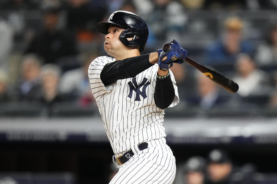 New York Yankees' Isiah Kiner-Falefa watches his two-run home run during the fifth inning of the team's baseball game against the Baltimore Orioles on Wednesday, May 24, 2023, in New York. (AP Photo/Frank Franklin II)