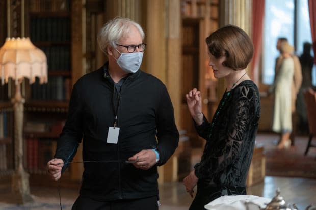 Director Simon Curtis and Michelle Dockery, in costume as Lady Mary. <p>Photo: Ben Blackall/Courtesy of 2022 Focus Features, LLC</p>