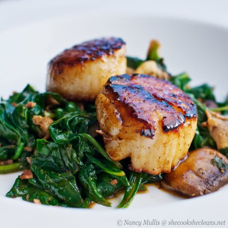 <p>She Cooks She Cleans</p><p>The apple cider glaze would really bring out the natural sweetness of the scallops. Add spinach and mushrooms to that for some earthiness, a bit of bacon to add a touch of saltiness, and you have a meal!</p><p><strong>Get the recipe: <a href="https://shecookshecleans.net/2011/06/07/seared-scallops-with-apple-cider-balsamic-glaze/" rel="nofollow noopener" target="_blank" data-ylk="slk:Seared Scallops with Apple Cider Balsamic Glaze;elm:context_link;itc:0;sec:content-canvas" class="link ">Seared Scallops with Apple Cider Balsamic Glaze</a></strong></p>