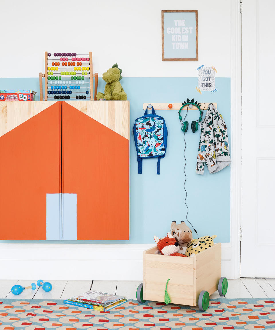 Encourage tidiness with a toy cupboard