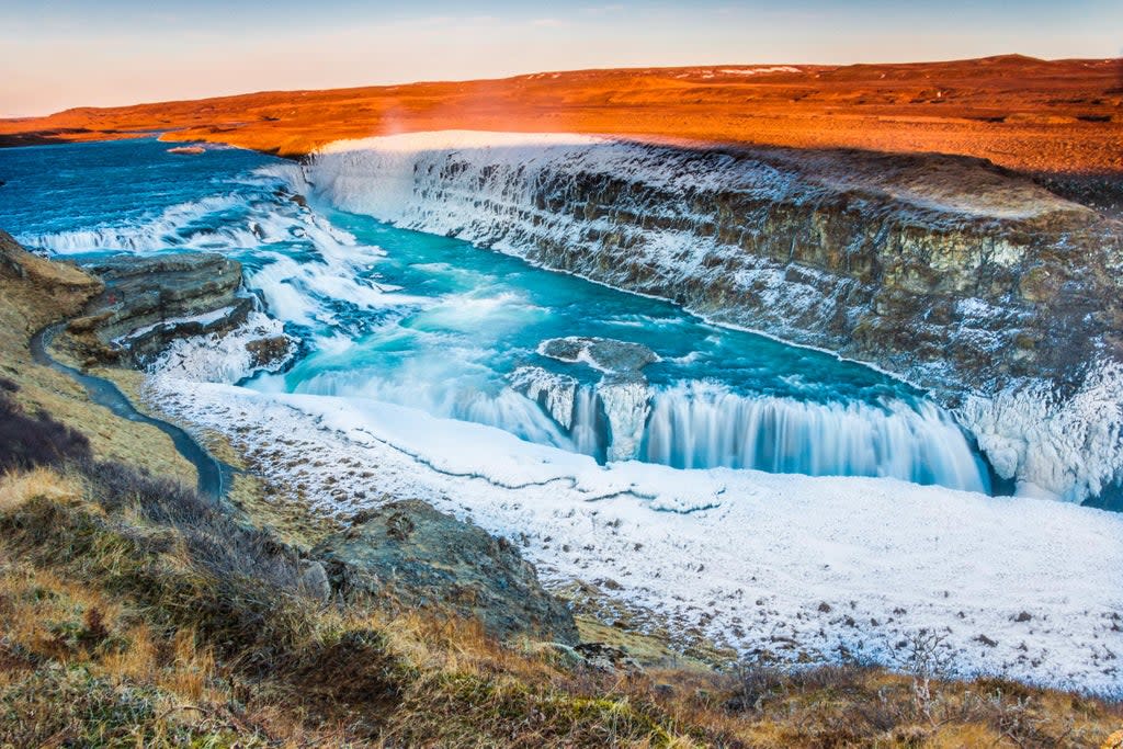 Amazing Icelandic winter landscape of majestic waterfall of frozen Gullfoss (iStock)