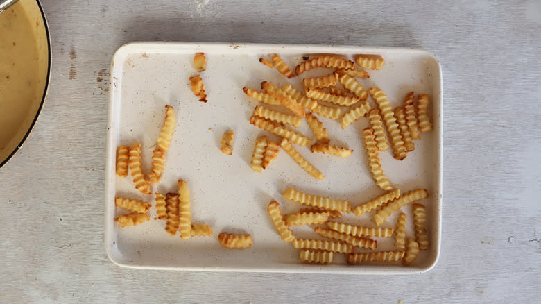 french fries on a baking sheet