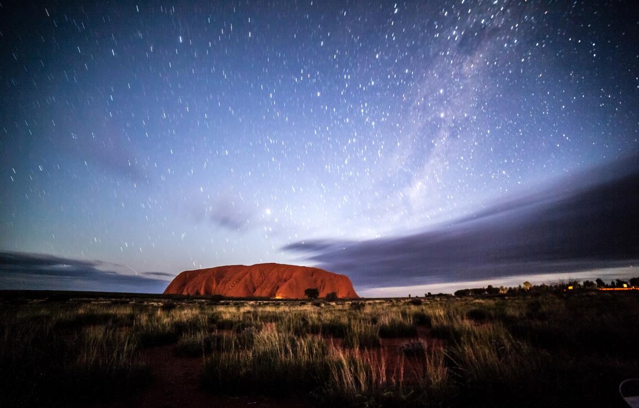 Join a land tour as part of an Australia cruise and you could enjoy the night sky above Ayers Rock - swissmediavision