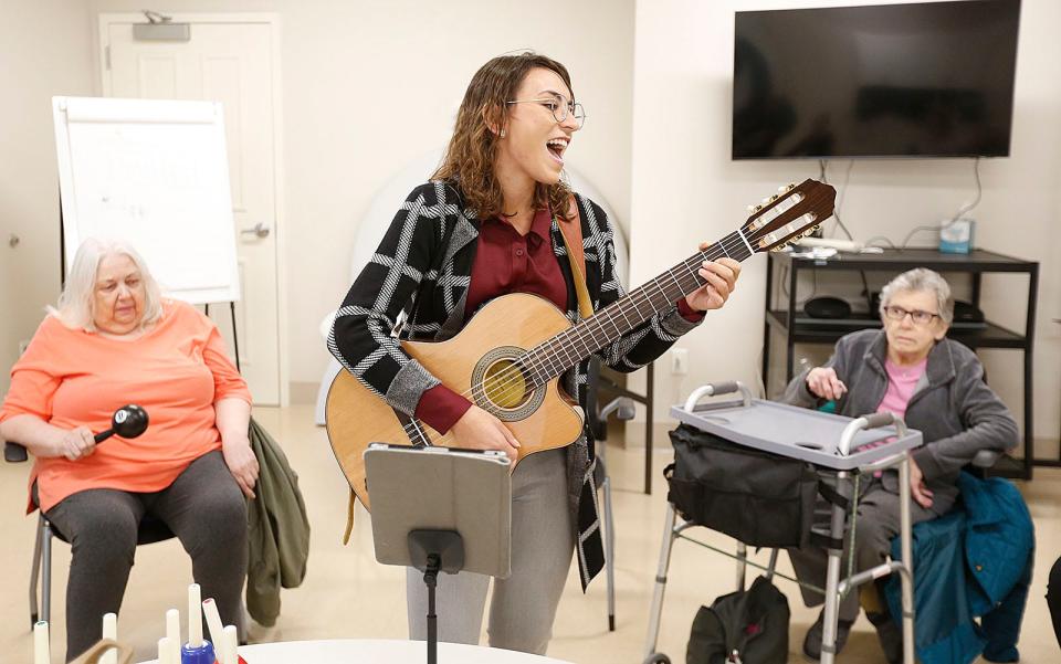 Music therapist Rachel Davis, of Sing Explore Create in Rockland, encourages seniors at the Milton Senior Center to sing along, part of a new six-week music and wellness course called "Let's Make Music," on Wednesday, Oct. 5, 2022.