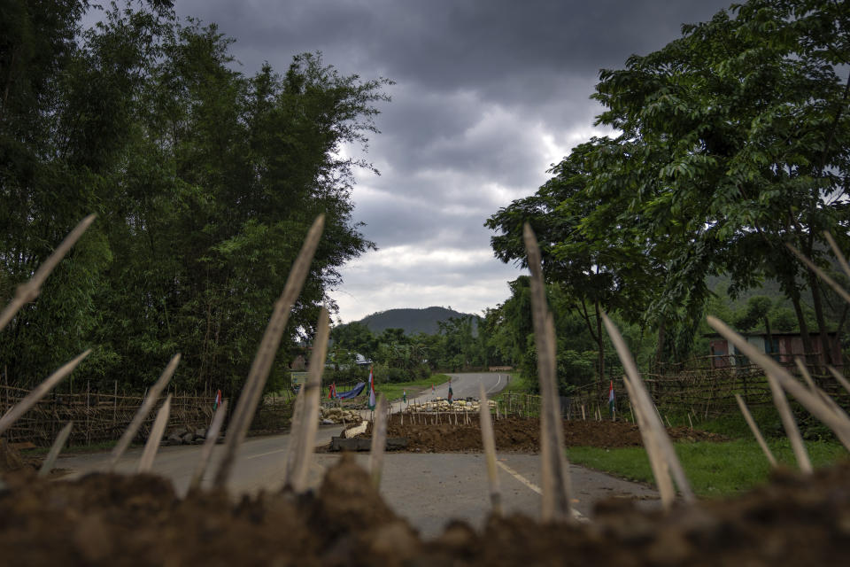 Fortifications made of bamboo in the shape of spears are placed at checkpoint at a de facto frontline dissecting the area into two ethnic zones in Churachandpur, the northeastern Indian state of Manipur, Tuesday, June 20, 2023. Deadly clashes, which have left at least 130 dead by the authorities’ conservative estimates, persist despite the army’s presence in the state that now remains divided in two ethnic zones. The two warring factions have also formed armed militias and isolated villages are still raked with gunfire. More than 60,000 people have fled to packed relief camps. (AP Photo/Altaf Qadri)