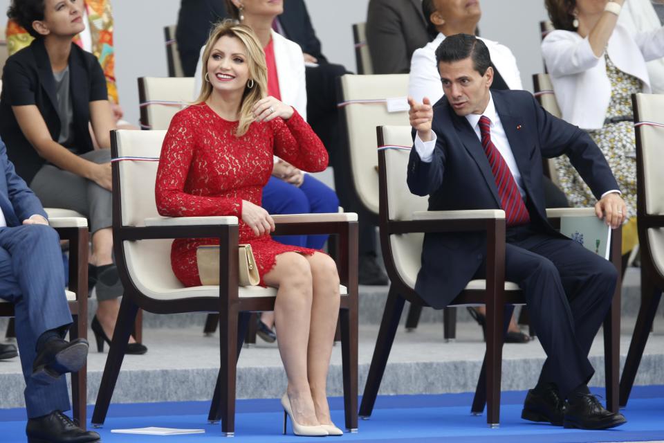 Mexico's President Enrique Pena Nieto and Mexico's First Lady Angelica Rivera attend the traditional Bastille Day military parade in Paris