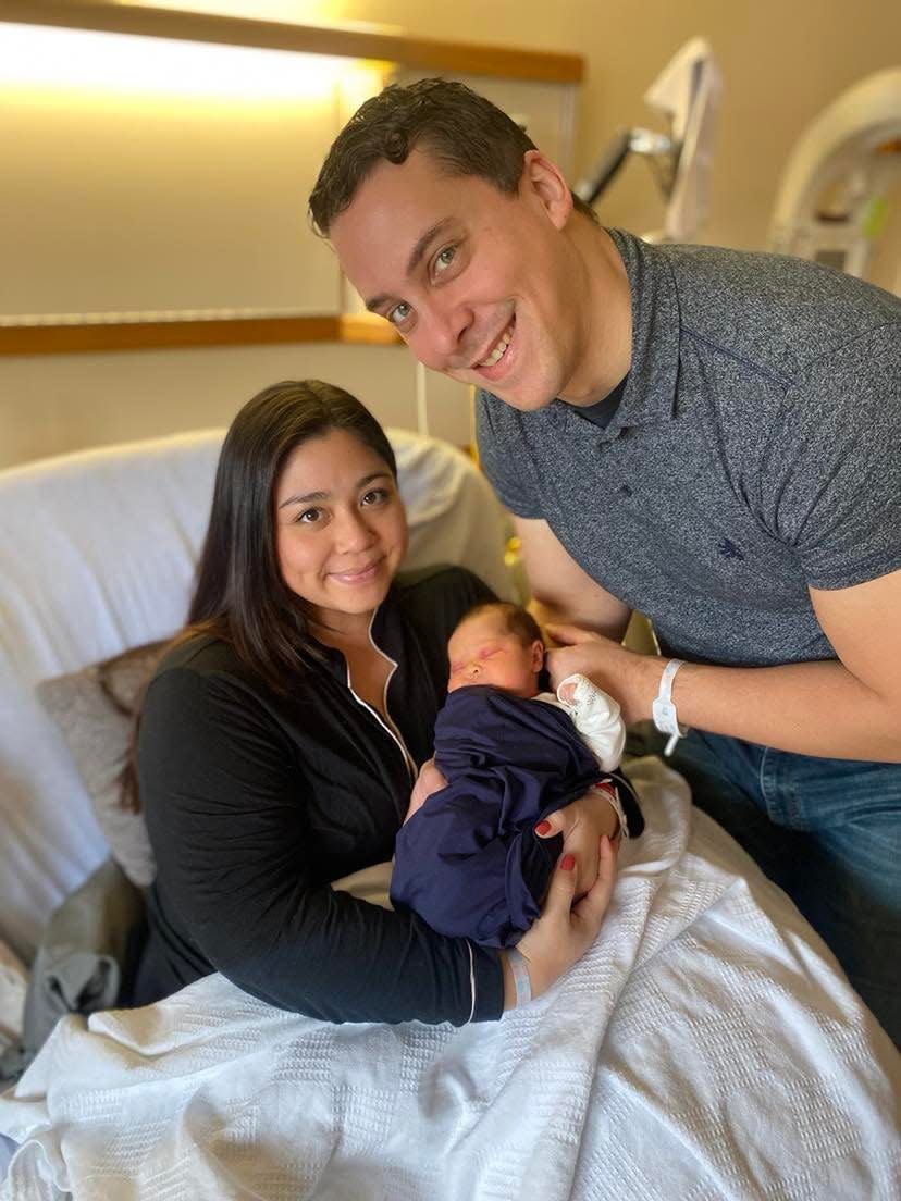 Atlas Wilder Bereczky entered the world at 3:13 p.m. New Year's Day, making him 2023's first baby born at Methodist Medical Center of Oak Ridge. He poses for a photo here with his parents, Knoxville residents Whitney Kleyh and Andrew Bereczky.