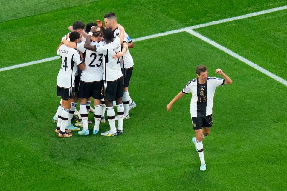 Germany celebrate after scoring on a penalty kick (AP)